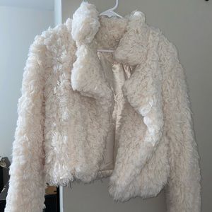 fluffy white/cream coat